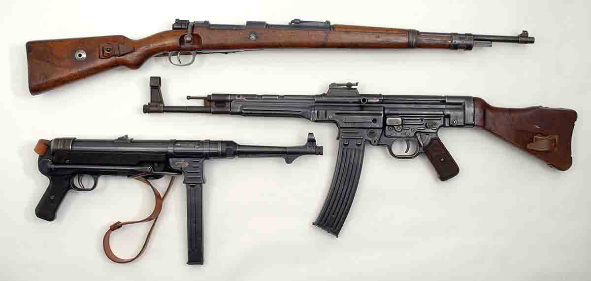 The MP44/Sturmgewehr (middle) was intended to replace both the MP40 submachine gun (bottom) and the K98k Mauser rifle (top).